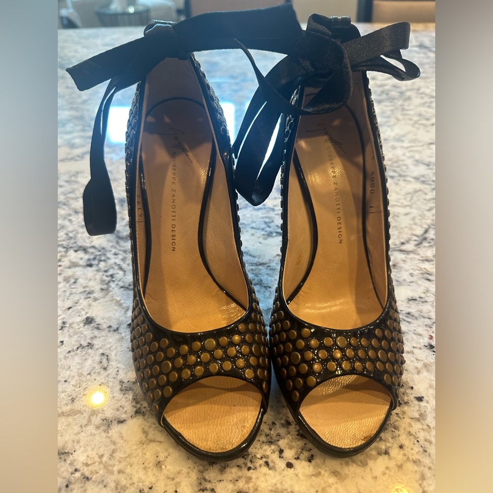 Women’s size 38 black Giuseppe Zanotti heels w:gold grommet details